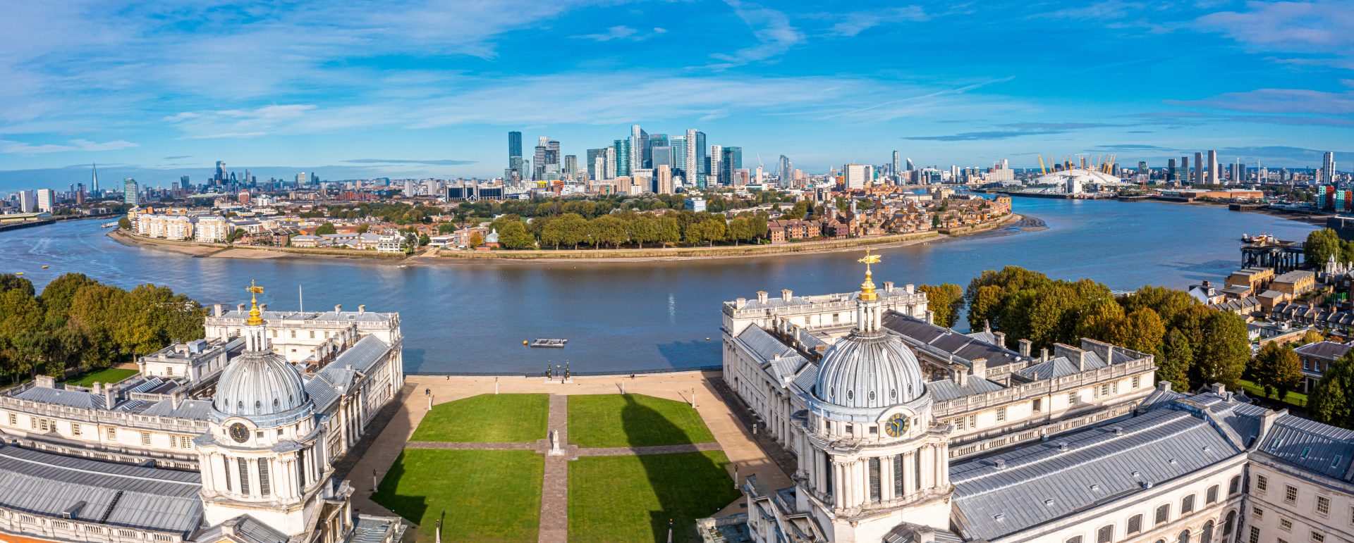 Aerial view of Greenwich with River Thames and the City and 02 in the distance